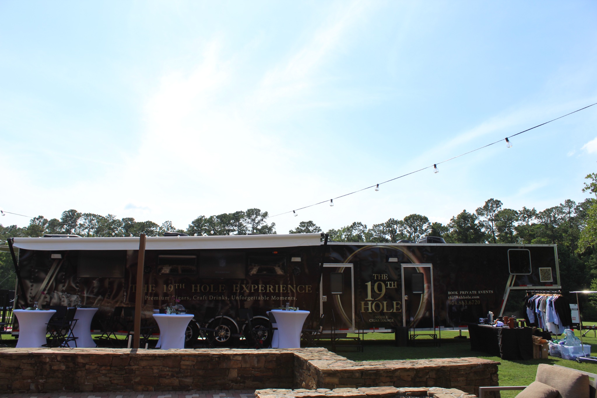 Full exterior setup of The 19th Hole Experience at a real event